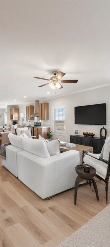 Open-plan living room and kitchen in a 1705 Holdings custom home
